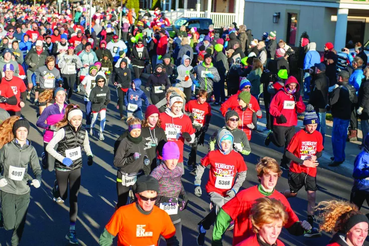 Participants running in the Y Turkey Trot Charity 5K