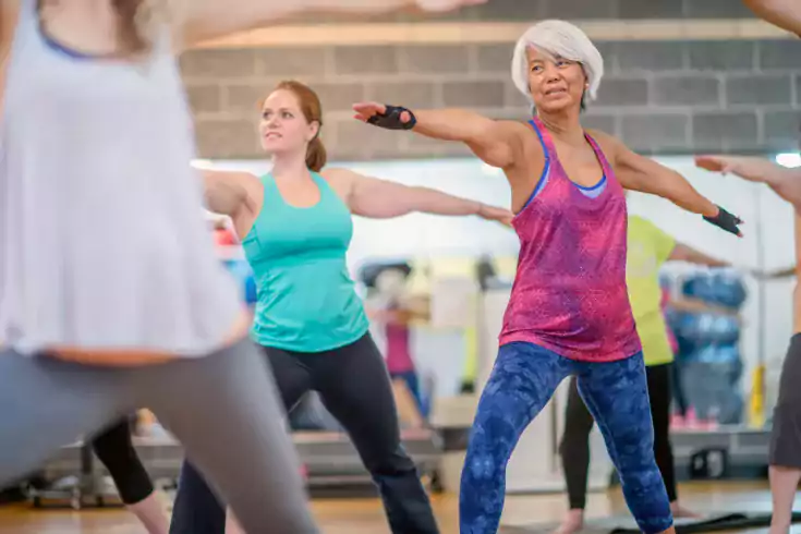 Older woman in group exercise class