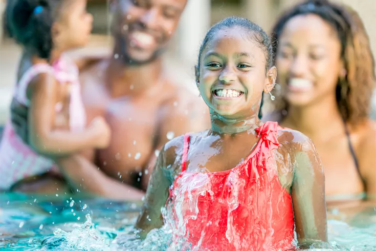 family in pool