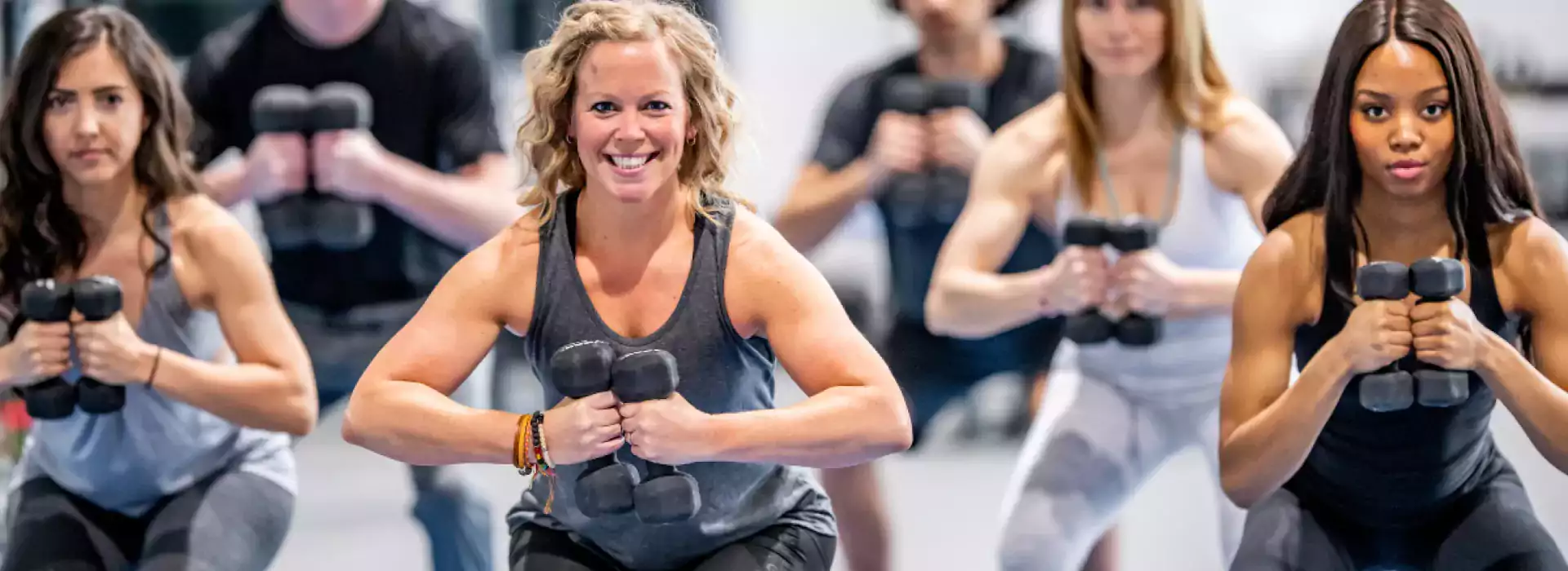 Group exercise class using weights