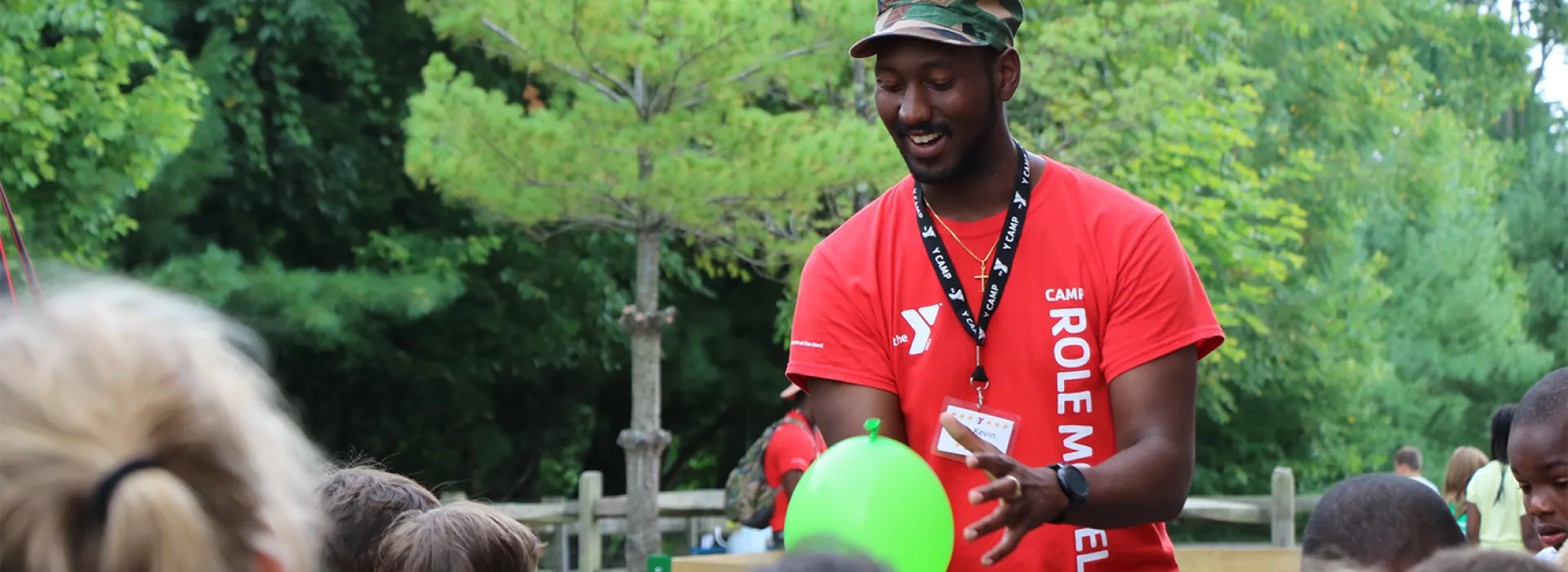 Y Camp counselor with kids