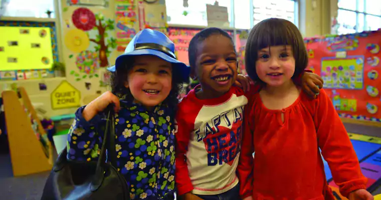 Three happy preschoolers
